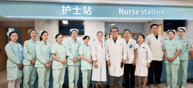 Healthcare professionals gathered at a nurse station during the 2026 China Healthcare Mission